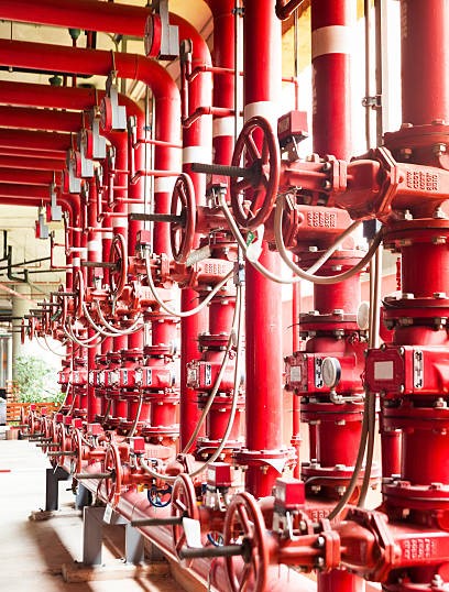 A row of red color fire fighting water supply pipeline system